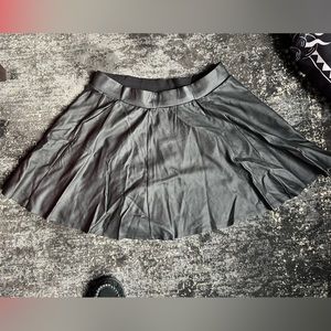 Black leather mini skirt